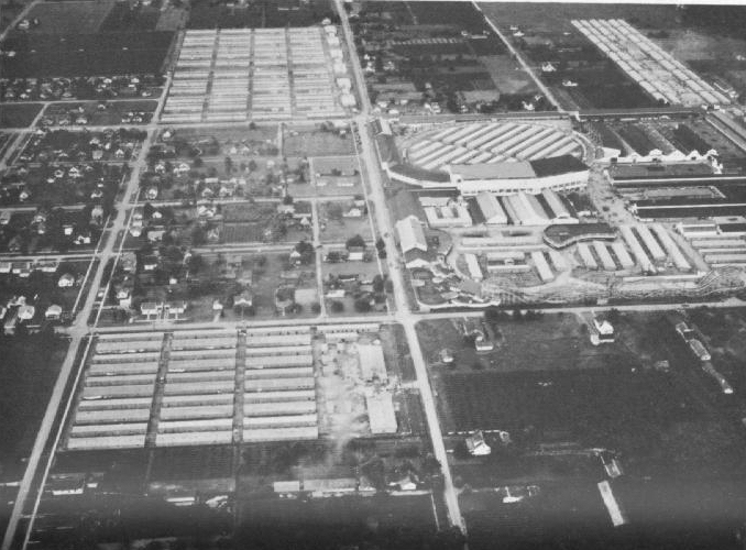 Aerial photograph of the Puyallup fairgrounds in 1942, showing rows of hastily built barracks where Japanese American detainees were held before transfer to Minidoka